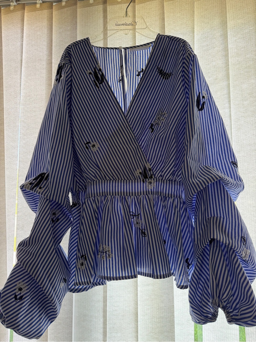 the room Blue and White Striped Wrap Peplum Blouse